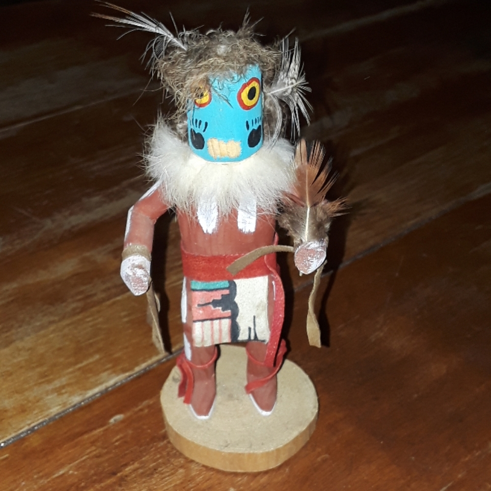 Handcrafted Figurine with Feathers